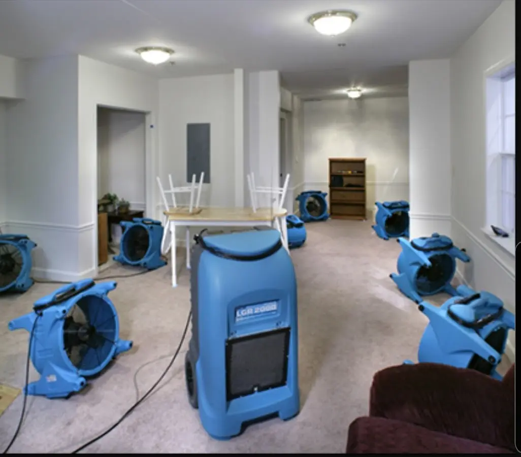 Air movers and dehumidifier setup for Water Damage Restoration in Muscle Shoals